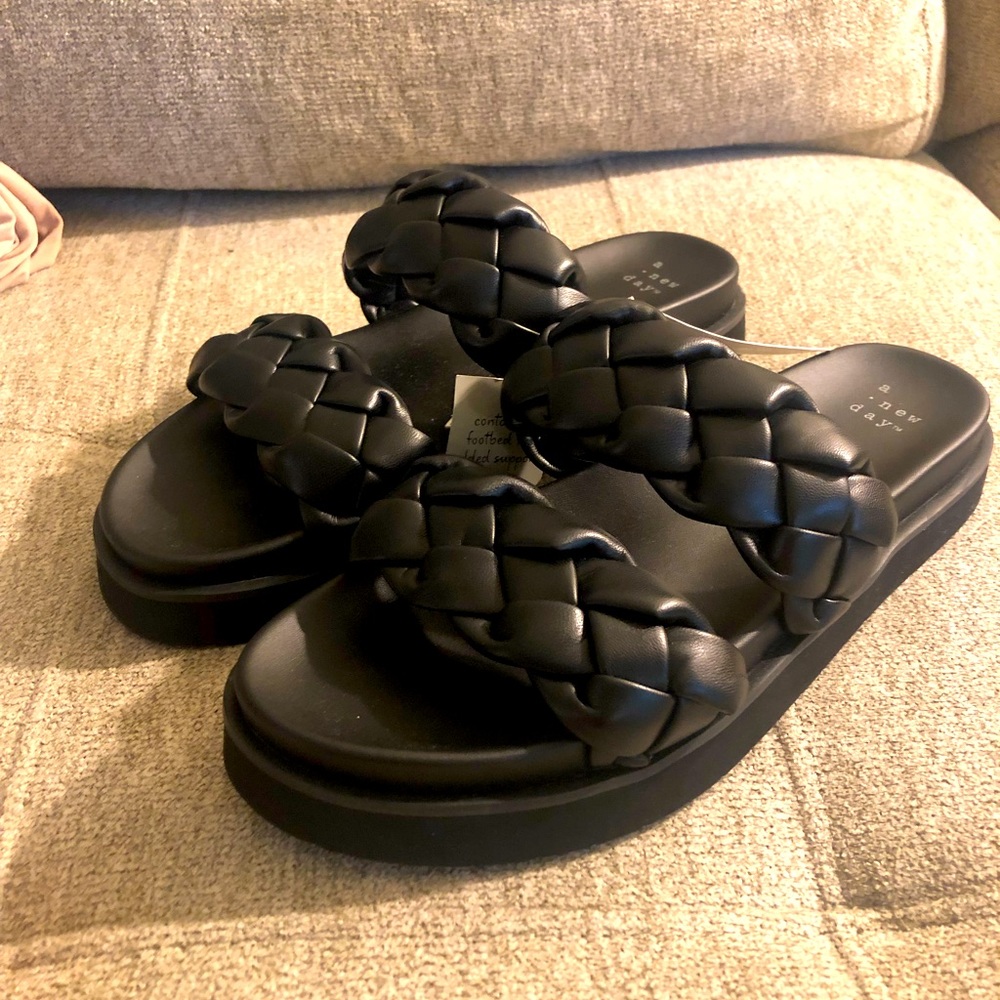 Black woven sandals
